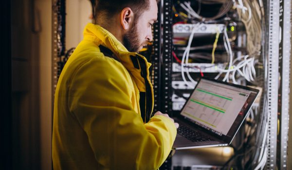 Young man engineer making program analyses